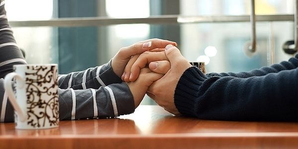 couple holding hands narrative therapy